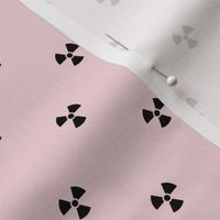 Black Radiation Symbols on a Cotton Candy Pink Background