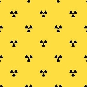 Black Radiation Symbols on a Yellow Background