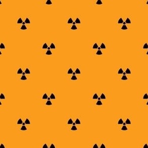 Black Radiation Symbols on an Orange Background