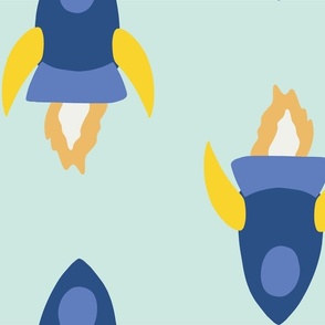 Large jumbo scale rocket space ships in blue on mint green for outer space kids. 