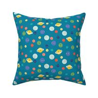 Happy planets in on bright teal blue for space fans! Tossed celestial planets for kids and baby