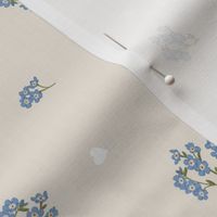 Forget me not and hearts on beige, dainty wildflowers