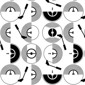 M - Playing a vinyl record - black and white