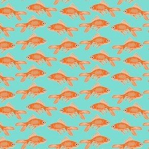 tiny goldfish on teal