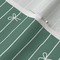 The Minimalist - Ribbons and bows birthday and christmas present theme abstract strings of bows white on sea green