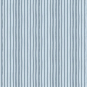 Colorful pastel blue stripes. Simple vertical lines