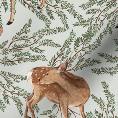  Cute deer with green tree branches around. Woodland deer