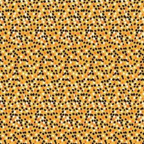 Simple dots on yellow. Orange polka dots