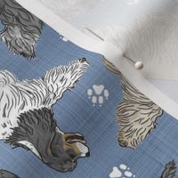 Trotting tailed Cocker Spaniels and paw prints - faux denim