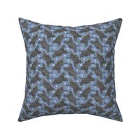 Tiny Trotting black tailed Cocker Spaniels and paw prints - faux denim