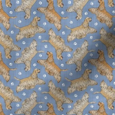 Tiny Trotting buff tailed Cocker Spaniels and paw prints - faux denim