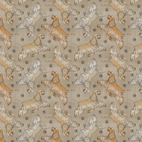 Trotting buff tailed Cocker Spaniels and paw prints - faux linen