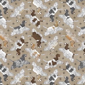 Trotting parti tailed Cocker Spaniels and paw prints - faux linen