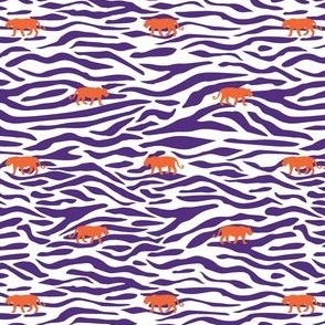 white background with purple tiger stripes and orange mini tigers