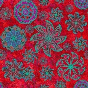 Retro vintage boho mandala flowers on abstract texture background reds and cyans