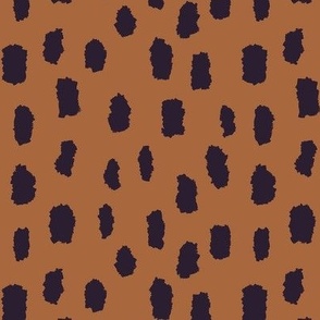 Black marks on brown background_medium