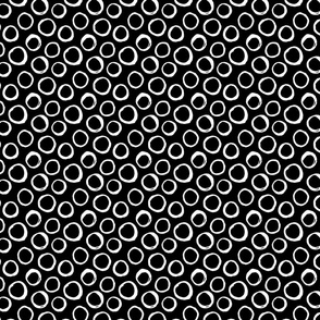 white circles on black