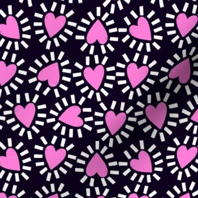Pink hearts on black