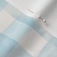 Light blue plaid check fabric. Watercolor pastel check pattern.