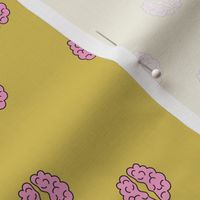 Smart is sexy - nineties style brain design for students and teachers pink on ochre yellow