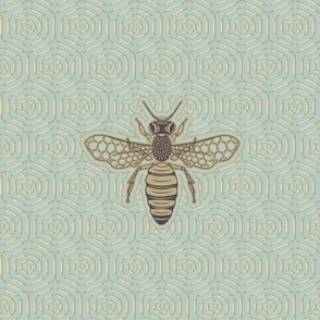 Decorative golden bee on a honeycomb background texture