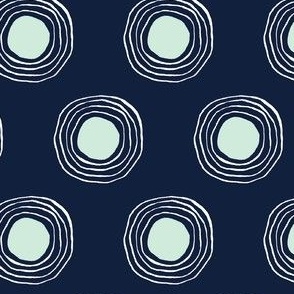 Aqua ripples concentric circles on navy blue ground