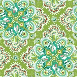 Conversational print with decorative medallions and colorful floral peacocks - mint and green - large scale