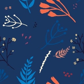 Silhouettes of leaves and branches on navy blue