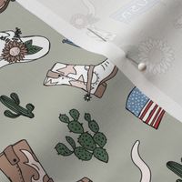 Little cowboy freehand western illustrations texas ranch life with longhorn skull flag boots and cacti vintage red blue on sage green