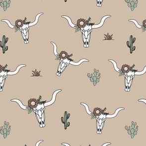 Ranch life with longhorn cows skull boho flowers and cacti western desert theme on tan beige