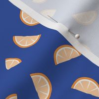 Fruit garden - orange and lemon citrus fruit slices fruit garden summer design on peach orange on classic blue