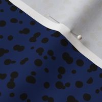 Dalmatian spots in black on navy blue winter abstract minimalist animal print