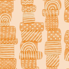 Painted pebbles | Outdoor Oasis collection | orange painted pebbles on peach by Sarah Price