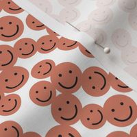 small smiley faces: dirty apricot