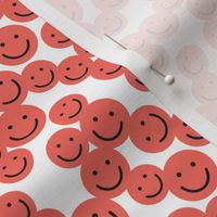 small smiley faces: coral