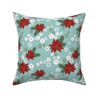Christmas vines and holiday blossom flowers botanical seasonal mistletoe and poinsettia flower design traditional ruby red green on teal aqua blue