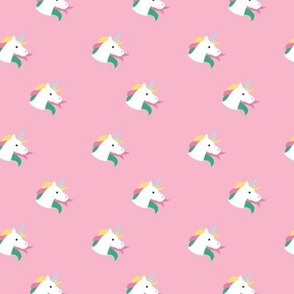 Sweet kawaii unicorn faces with long hair and magical horn kids fantasy dreams in retro nineties pink green yellow on pink girls