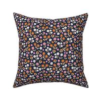 Wildflowers meadow ditsy flowers blossom garden delicate floral design pink orange blush on navy blue