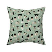 Library of cats and books kitten and cat lovers reading theme scandinavian hygge design pink mint blush on sage green