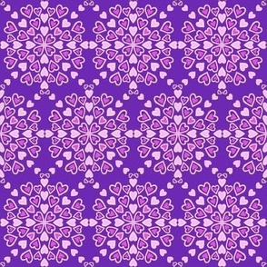 Pink hearts pattern on purple 