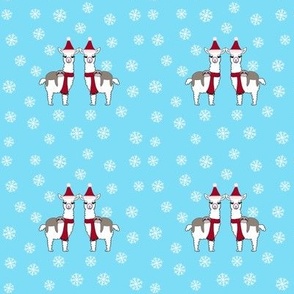 Christmas llamas and sloths on blue