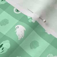 (small) Cute green checkered pattern for Halloween with ghosts, pumpkins, mushrooms... and an eye