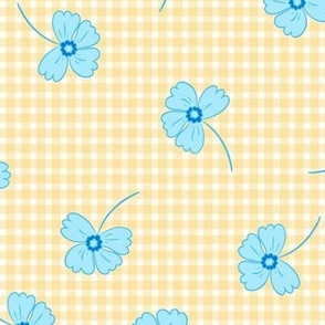 scattered blue flowers on check yellow gingham larger scale