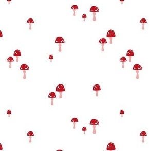 Little abstract autumn mushrooms in red blush on white