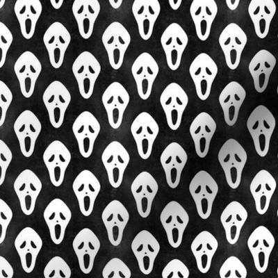 Small Scale White Halloween Scream Face Masks on Black