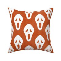 Large Scale White Halloween Scream Face Masks on Orange