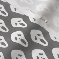 Small Scale White Halloween Scream Face Masks on Grey