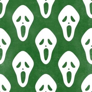 Large Scale White Halloween Scream Face Masks on Green