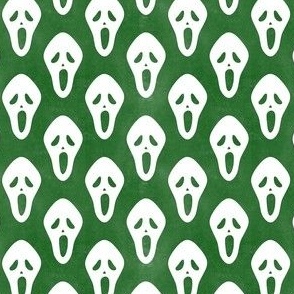 Small Scale White Halloween Scream Face Masks on Green