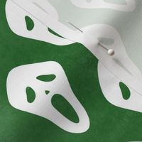 Medium Scale White Halloween Scream Face Masks on Green